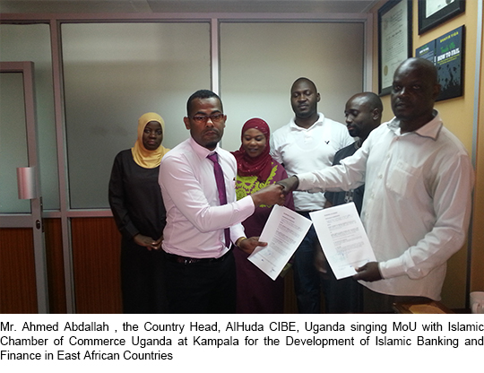 Mr. Ahmed Abdallah , the Country Head, AlHuda CIBE, Uganda singing MoU with Islamic Chamber of Commerce Uganda at Kampala for the Development of Islamic Banking and Finance in East African Countries